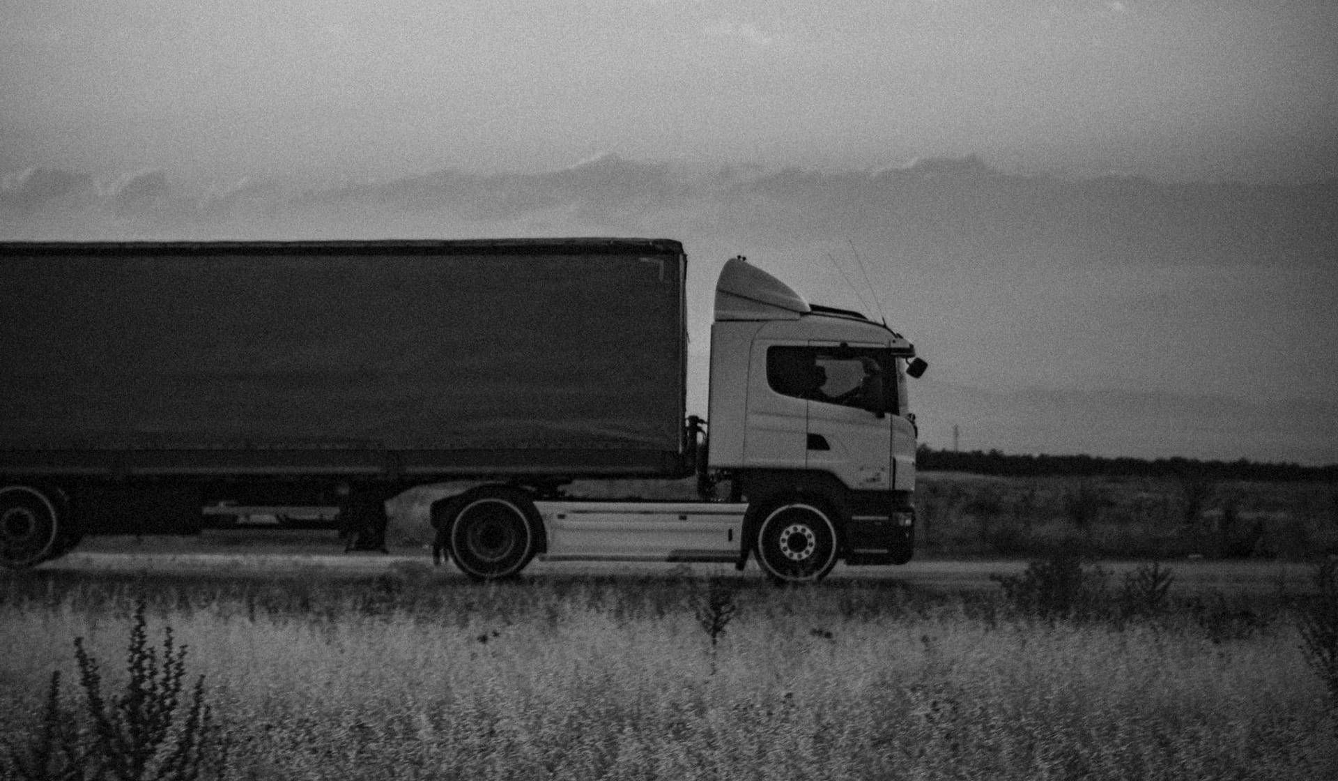 A heavy semi-trailer at dusk, the kind of rig B&R Mechanical Services keeps braking safely