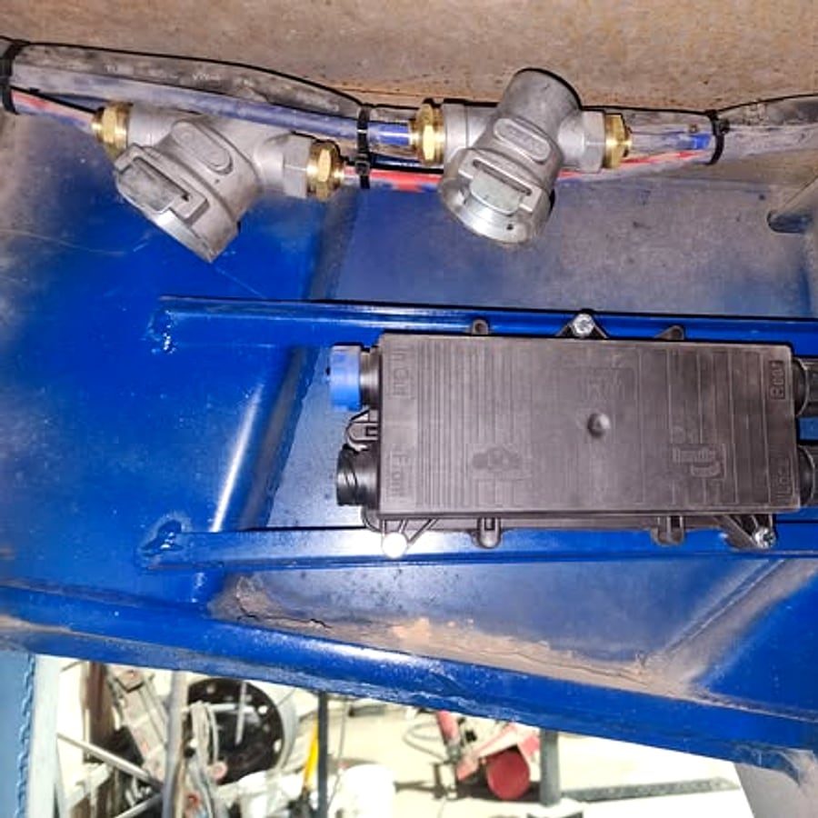 Close up of an EBS unit mounted on a trailer chassis